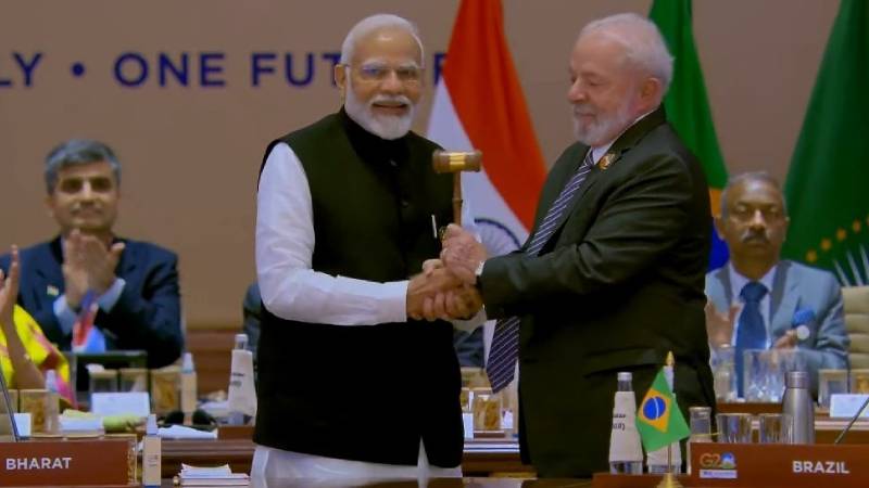 https://newsfirstlive.com/wp-content/uploads/2023/09/Modi-G20-Baton.jpg